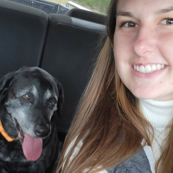 Tianna-VetAssistant-with dog